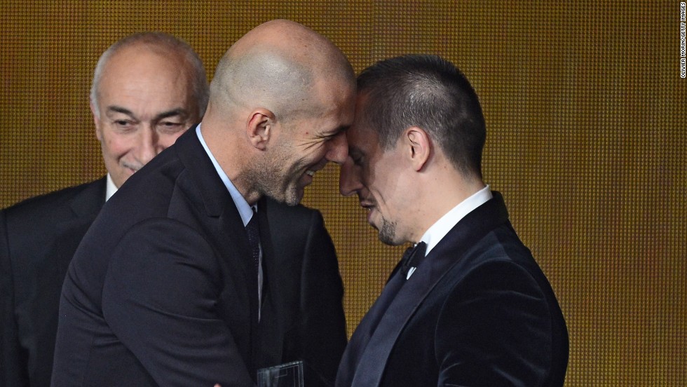 This was not a repeat of Zinedine Zidane&#39;s headbutt in the 2006 World Cup, but a warmer embrace as the Frenchman hands Bayern Munich&#39;s Franck Ribery his FIFA/FIFPro World XI award. Once tipped to win the main prize itself, Ribery eventually finished third despite winning five major trophies in 2013. 