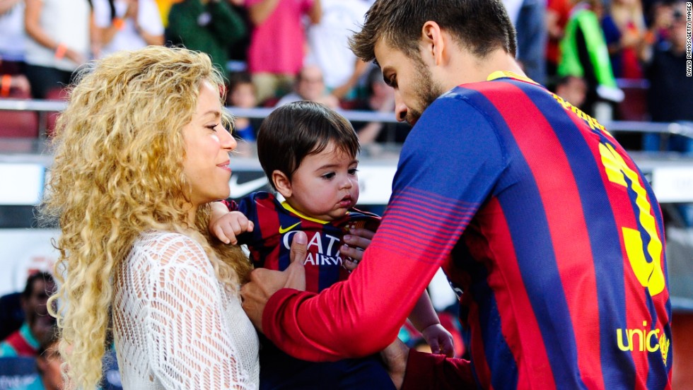 Shakira and Gerard Pique of FC Barcelona are seen with son Milan prior to the La Liga match in 2013. The famous parents live in Spain and are raising their two children, Milan and Sasha, to speak Spanish and English.