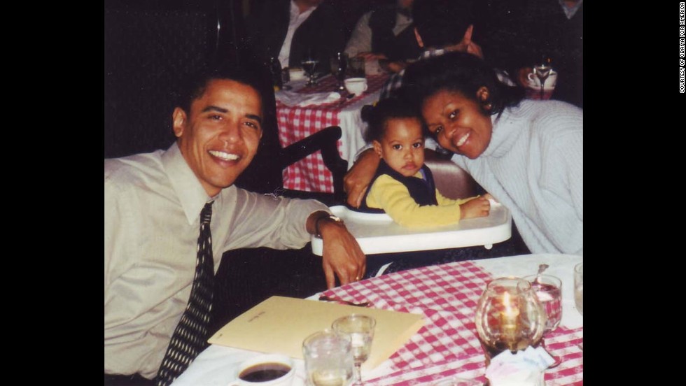 The Obamas have dinner in 2000 with their first child, Malia. Malia was born on July 4, 1998.