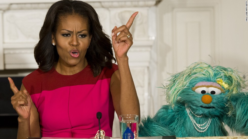 Obama dances alongside &quot;Sesame Street&quot; character Rosita at the White House in October 2013 as part of the first lady&#39;s &quot;Let&#39;s Move&quot; initiative.