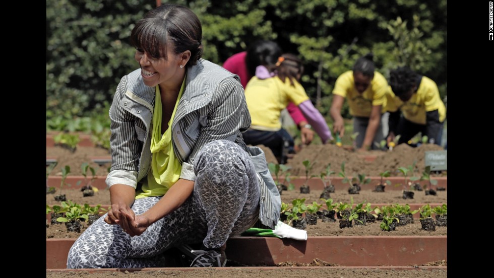 Obama plants the White House Kitchen Garden on the South Lawn of the White House in April 2013. To help her, she invited students from schools &quot;that have made exceptional improvements to school lunches.&quot; It was part of the first lady&#39;s &quot;Let&#39;s Move&quot; campaign, which she launched in 2010 to reduce childhood obesity. 