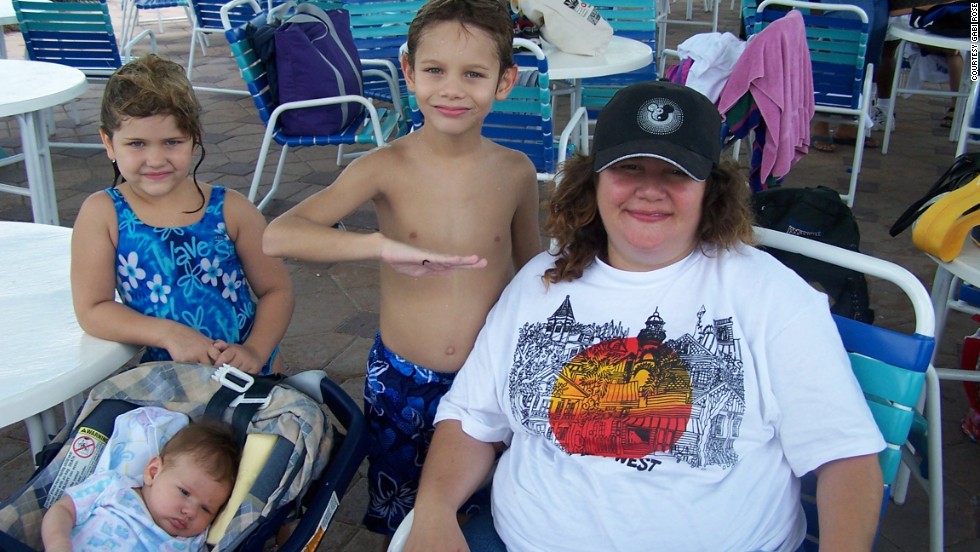 Gabi Rose suffered with weight problems for more than a decade before she led her family on a weight-loss journey. In 2004, the year this photo was taken, she weighed 298 pounds. She&#39;s seen here with her older son Josh, younger son Noah and daughter Rachel in Pembroke Pines, Florida.