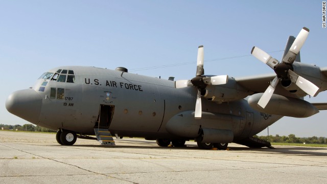 Stowaway's body found in Air Force plane