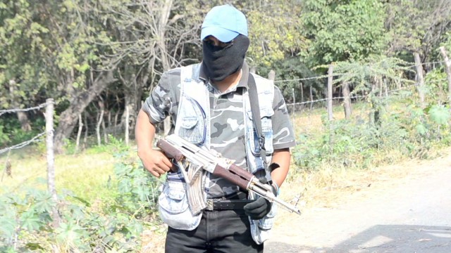 Vigilantes clash with Mexican cartels - CNN Video