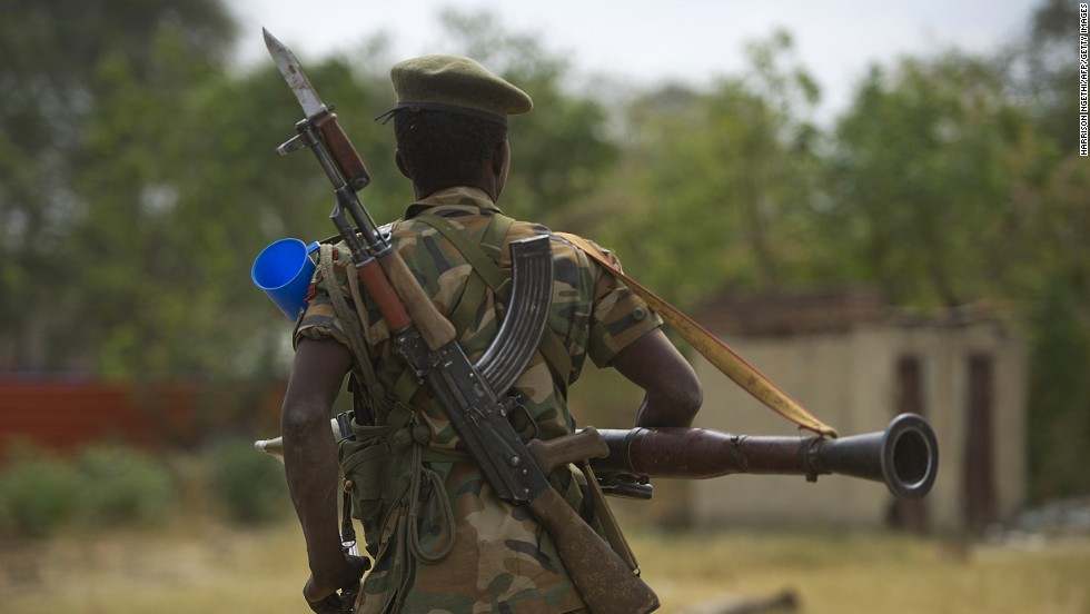 A South Sudanese People&#39;s Liberation Army soldier patrols in Malakal on Tuesday, January 21.