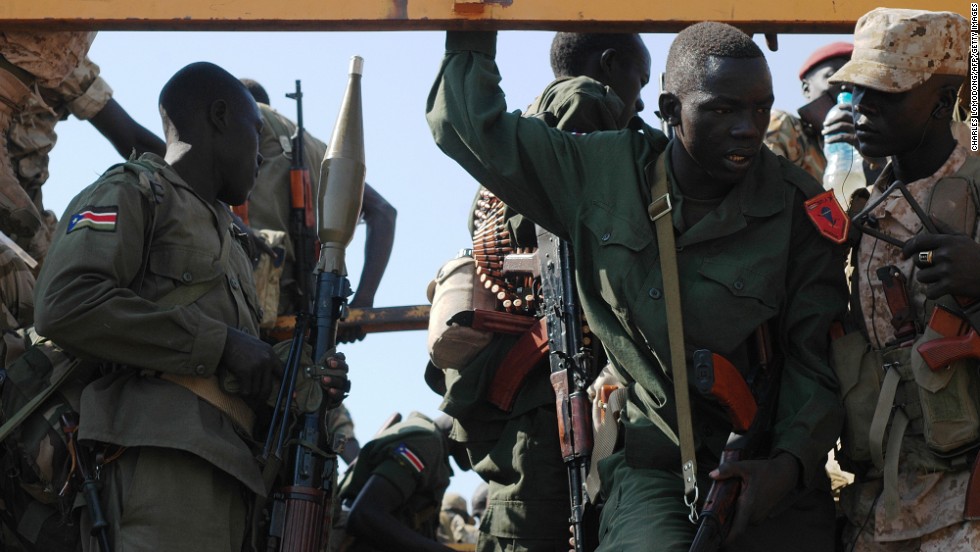 Government soldiers prepare to deploy from Juba on January 13 as fighting continues to rage in South Sudan. 