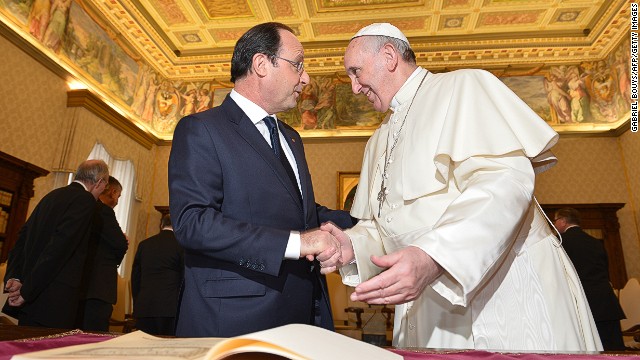 French President Francois Hollande, left, meets with Pope Francis on Friday at the Vatican. 