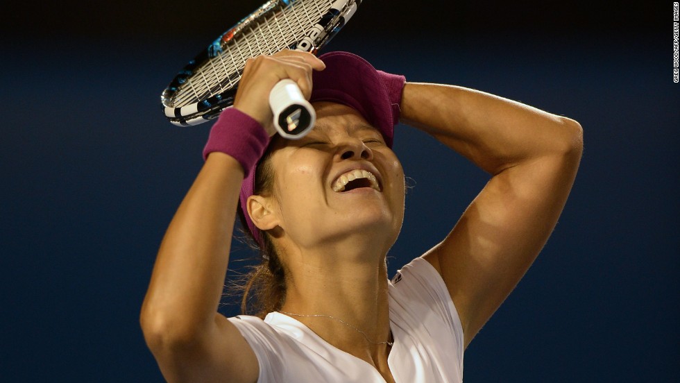 Li Na savors the moment of victory. The fourth seed in Melbourne overcame Slovakia&#39;s Dominika Cibulkova in straight sets 7-6 (7-3) 6-0 to win her first Australian Open title. 