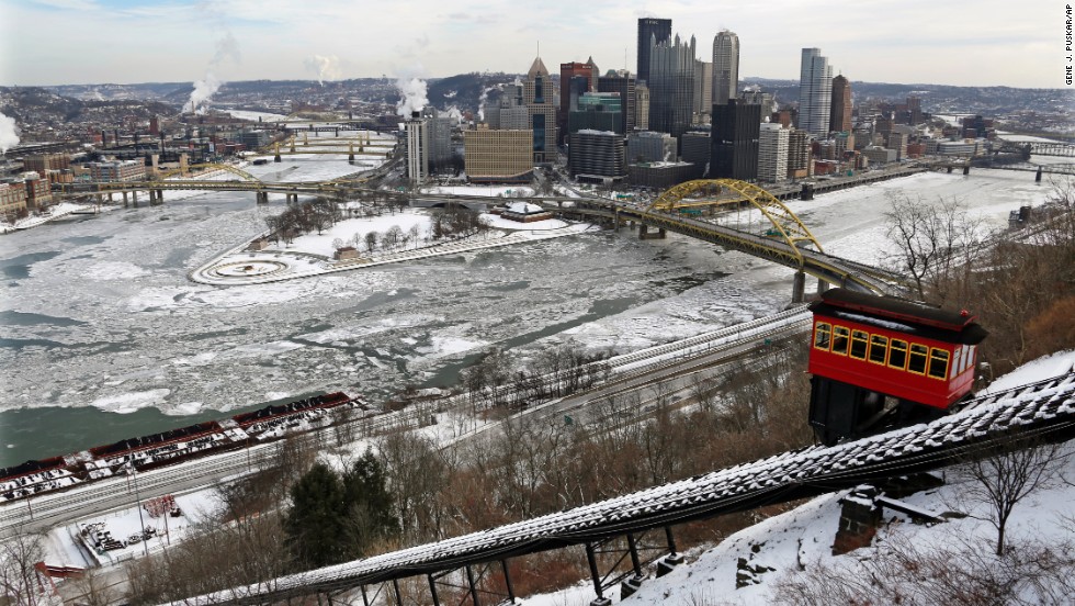 The Duquesne Incline climbs Mount Washington across the frozen Ohio, Allegheny and Monongahela rivers in downtown Pittsburgh on January 28.