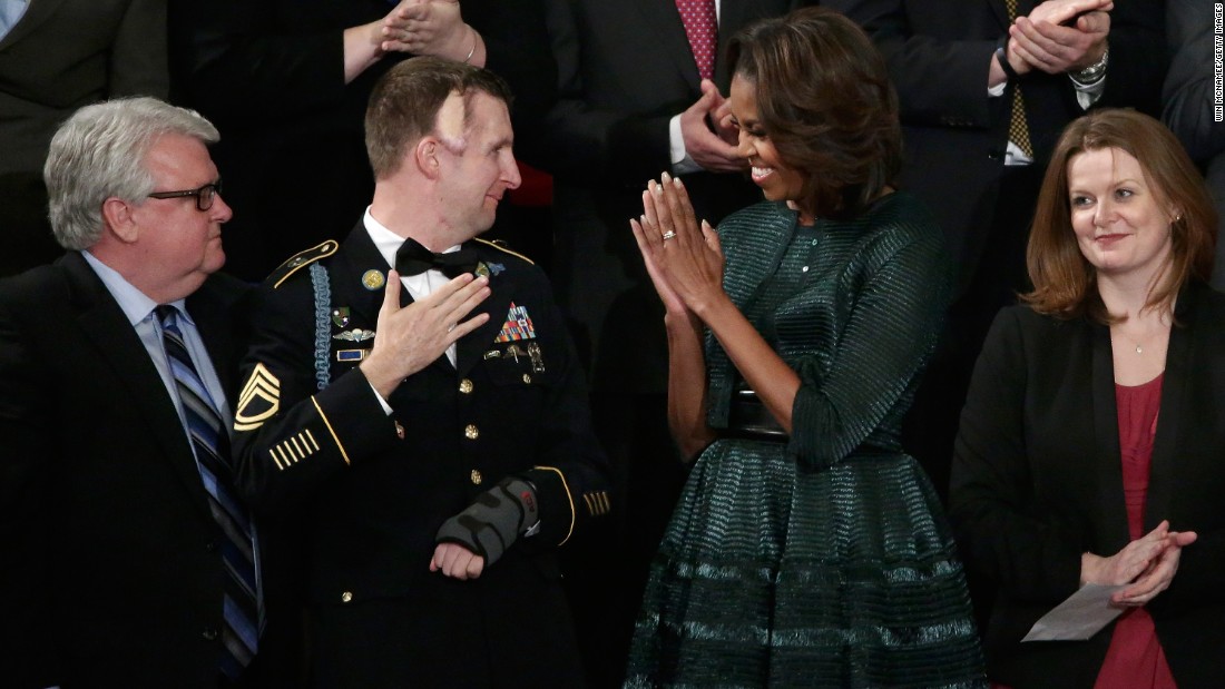 Obama wore &lt;a href=&quot;http://www.huffingtonpost.com/2014/01/28/michelle-obama-state-of-the-union-dress-2014_n_4676593.html&quot; target=&quot;_blank&quot;&gt;this forest green Azzedine Alaia ensemble&lt;/a&gt; -- which included a full-skirted dress, an oversized belt and a cropped jacket -- for the State of the Union address on January 28, 2014.
