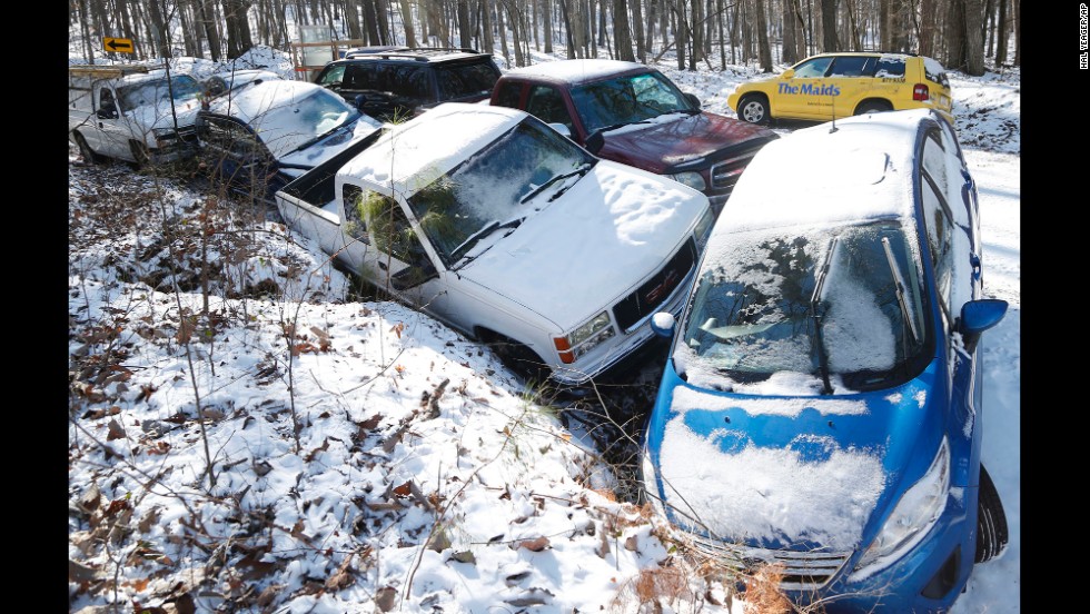 Cars are left abandoned at the bottom of a hill in Birmingham, Alabama, on January 30.