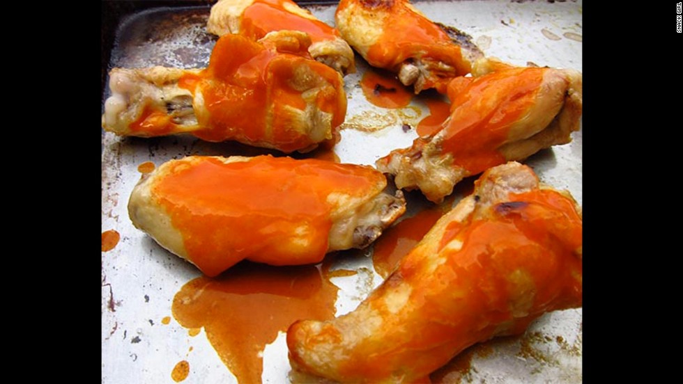 Most buffalo chicken wings are deep-fried and loaded with fat and calories. &lt;a href=&quot;http://snack-girl.com/snack/healthy-buffalo-chicken-wings-recipe/&quot; target=&quot;_blank&quot;&gt;This fitter option&lt;/a&gt; calls for boiling and baking the wings. 