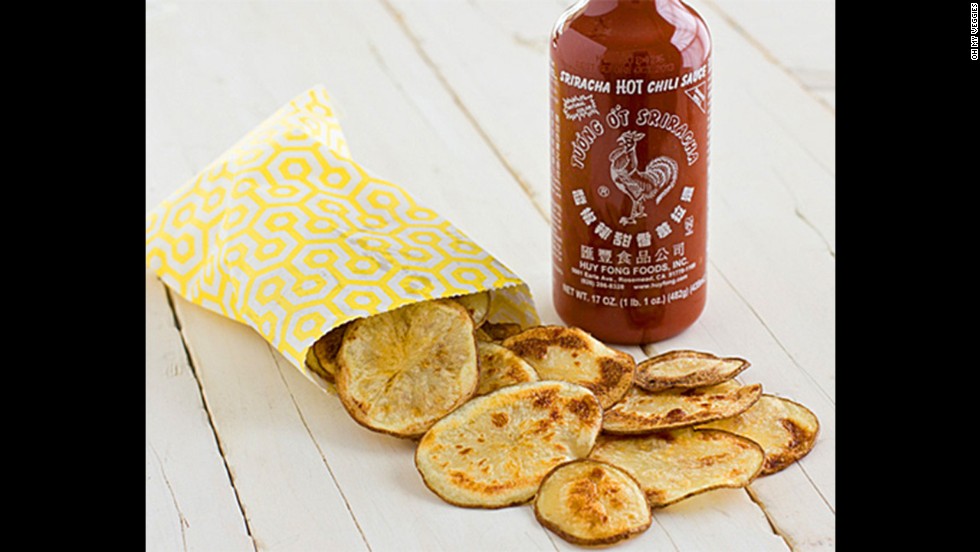 Don&#39;t forget the chips! Sriracha gives homemade potato chips a kick. You just need a Russet potato, sriracha, peanut oil and salt. 