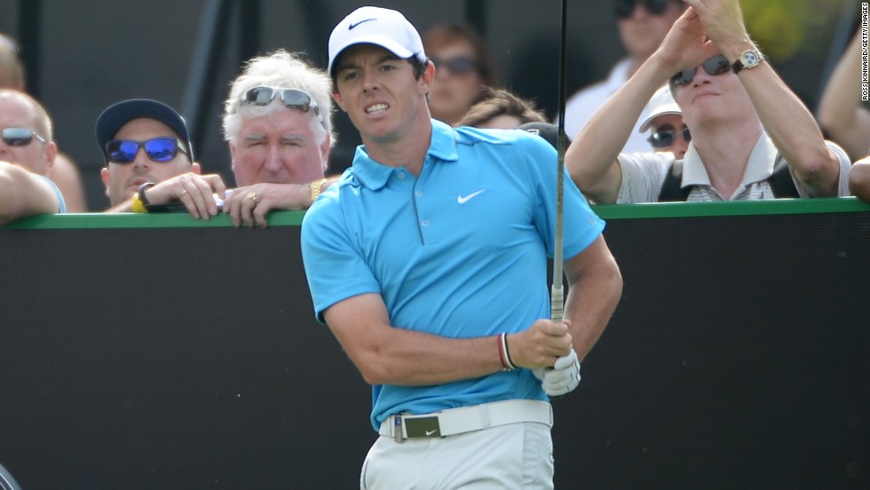 Rory McIlroy watches a tee shot during his third round at the Dubai Desert Classic at the Emirates Golf Club.
