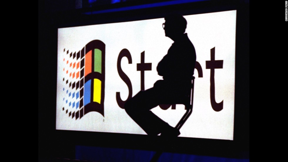 Gates sits on stage during a video portion of the Windows 95 launch event on August 24, 1995, on the company&#39;s campus in Redmond, Washington. A Harvard University dropout, Gates co-founded Microsoft with Paul Allen in 1975. 