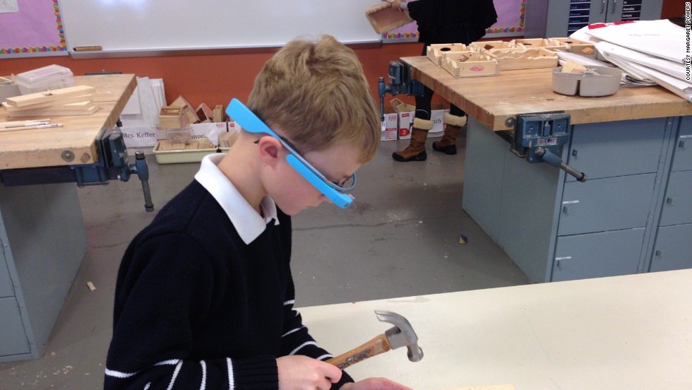 A young student uses Google Glass to record his work in art class at the Episcopal Academy in Newtown Square, Pennsylvania. Margaret Powers, who coordinates technology for the private school&#39;s youngest students, was selected for Google&#39;s Glass Explorer program, which allows people to test the wearable computer.
