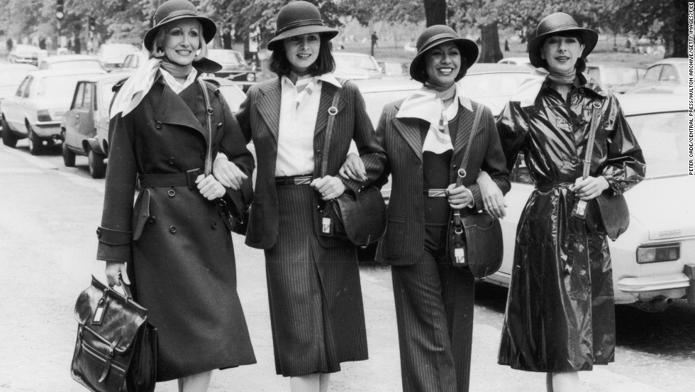 British Airways staff show off their new uniforms in 1977. Over the years, many airlines have commissioned outfits from top designers, such as Yves Saint Laurent for Qantas in the 1980s, Giorgio Armani for Alitalia in the 1990s, and Christian Lacroix for Air France in the 2000s. 