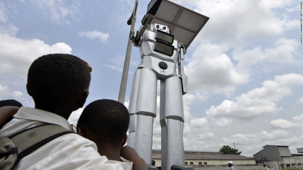 The eight feet-tall machines are designed to help drivers and pedestrians traverse the roads safely. 