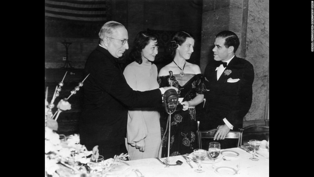 &lt;strong&gt;Luise Rainer (1937):&lt;/strong&gt; Luise Rainer, second from left, is seen at the 1937 ceremony with, from left, Louis B. Mayer, Louise Tracy and Frank Capra. Rainer won for &quot;The Great Ziegfeld.&quot;