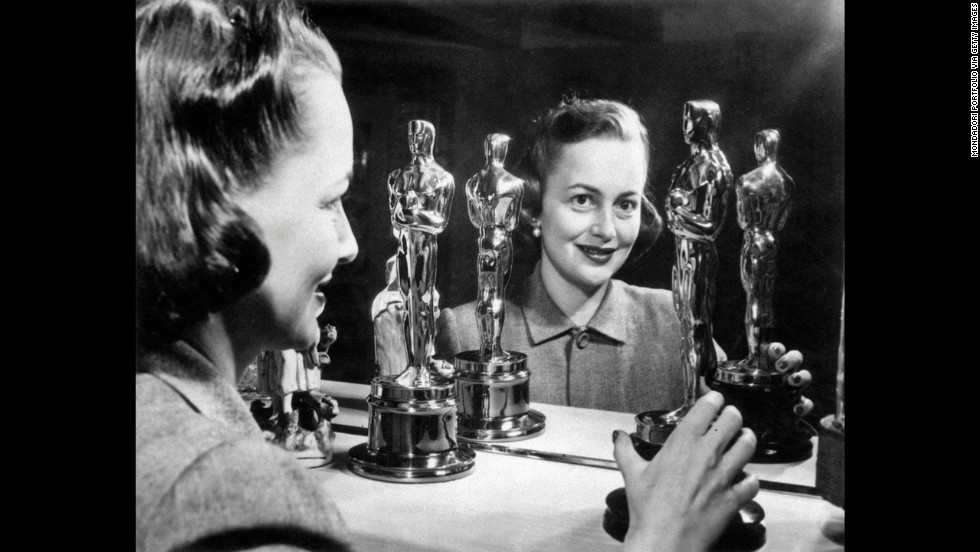 &lt;strong&gt;Olivia de Havilland (1950):&lt;/strong&gt; Olivia de Havilland looks at her two best actress Oscars. She won her second in 1950 for her role in &quot;The Heiress.&quot;