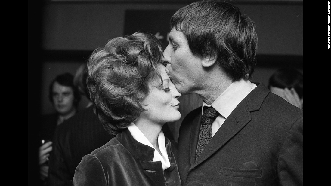 &lt;strong&gt;Maggie Smith (1970):&lt;/strong&gt; Maggie Smith, who won for &quot;The Prime of Miss Jean Brodie,&quot; celebrates with her husband at the time, Robert Stephens.
