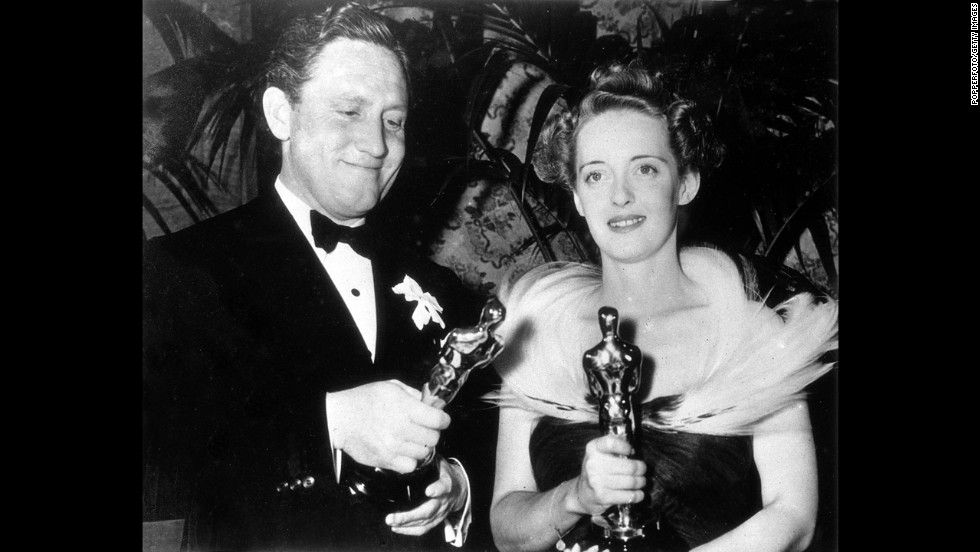 &lt;strong&gt;Spencer Tracy (1939):&lt;/strong&gt; Spencer Tracy takes home his second best actor Oscar for &quot;Boys Town.&quot; He appears here with Bette Davis, best actress for &quot;Jezebel,&quot; at the ceremony held in 1939.