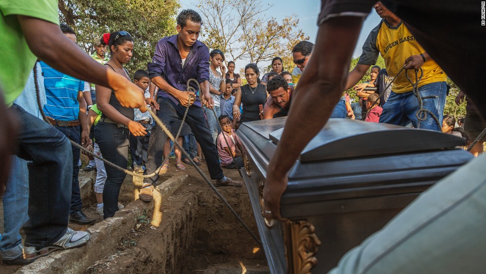 The casket is lowered at a funeral for a 49-year-old sugar cane worker in Chichigalpa, Nicaragua. Mortality rates from chronic kidney disease in La Isla community are so high that it is now called La Isla de Viudas, or &quot;The Island of Widows.&quot;