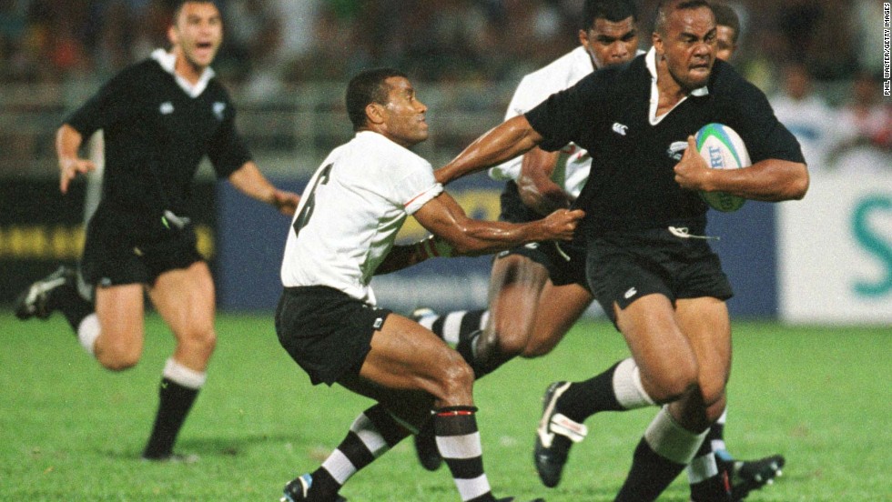 Lomu in action during the 1998 Commonwealth Games against Fiji, where not even the great Waisale Serevi (left) can stop him. New Zealand would go on to take the gold medal. Lomu was a passionate advocate of sevens: &quot;The greatest thing I love about it is the camaraderie that the players have among all the nations ... that come together to make this beautiful game.&quot; 