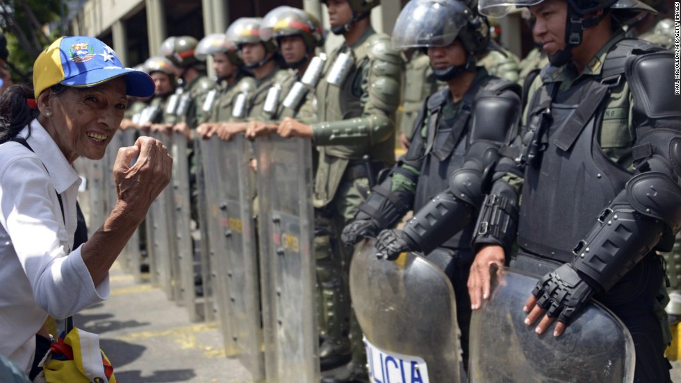 A supporter of Venezuelan opposition leader Leopoldo Lopez protests outside of the Palace of Justice in Caracas on February 19.