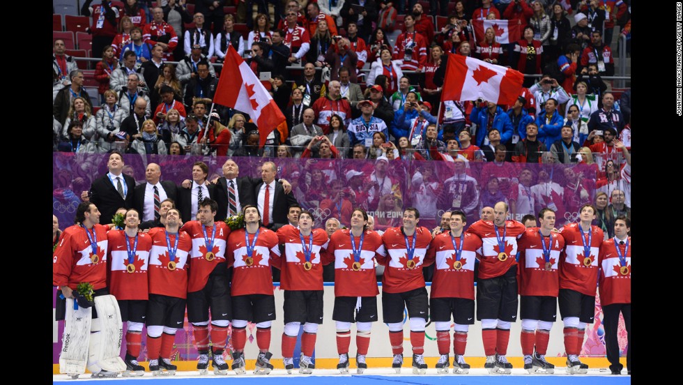 Canada&#39;s hockey team receives their gold medals in front of an ecstatic crowd on February 23.