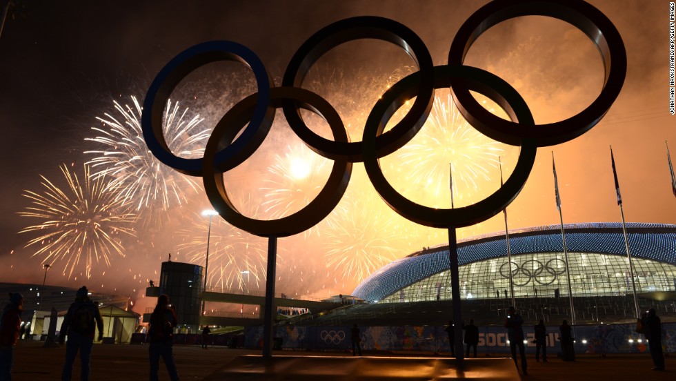 The Olympic rings are lit by fireworks as the closing ceremony comes to an end. 