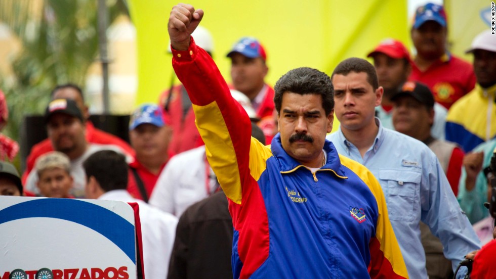 Venezuelan President Nicolas Maduro acknowledges the crowd during a motorcycle rally organized in support of his government February 24 in Caracas.