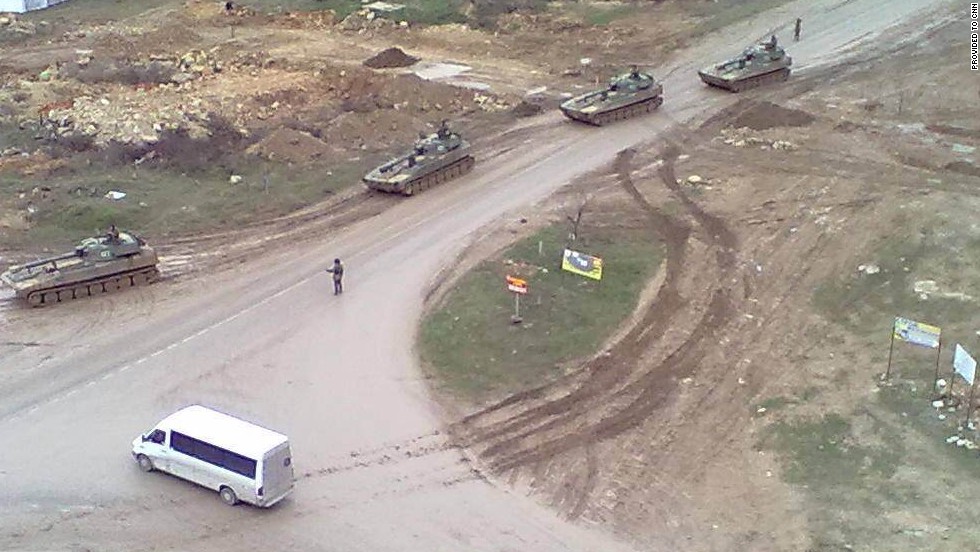 An image provided to CNN by a local resident shows Russian tanks on the move in Sevastopol.