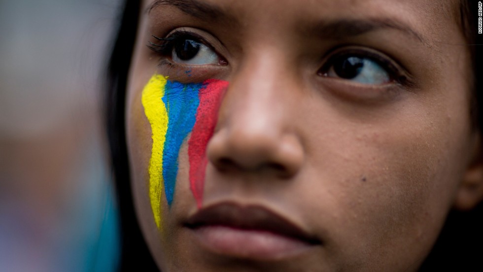 A demonstrator attends a rally with human rights activists in Caracas on Friday, February 28.
