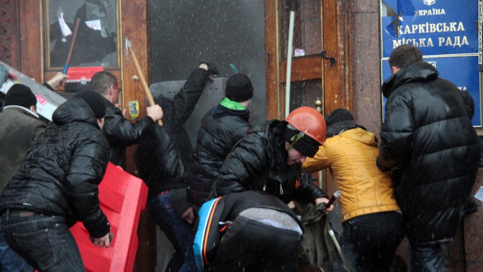 Pro-Russian activists clash with Maidan supporters as they storm the regional government building in Kharkiv, Ukraine, on March 1.
