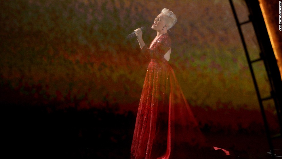 Pink sings &quot;Over the Rainbow&quot; while scenes from &quot;The Wizard of Oz&quot; are projected in the background. The performance was a tribute to the film&#39;s 75th anniversary.