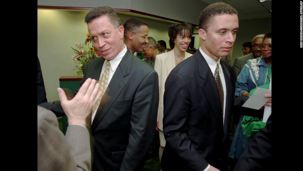 Then-Rep. Harold Ford, D-Tennessee, left, and his son, Harold Jr. shake hands with supporters in this 1996 photo. Harold Ford Sr. announced earlier that year that he was retiring from the seat he had held for 22 years and Harold Ford Jr. won the seat that fall.