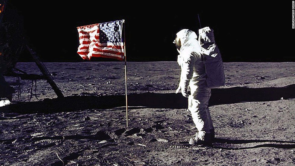 Apollo 11 astronaut Edwin E. &quot;Buzz&quot; Aldrin Jr. salutes the U.S. flag on the lunar surface on July 20, 1969. Aldrin and mission commander Neil Armstrong became the first humans to walk on the moon. Their mission was considered an American victory in the Cold War and subsequent space race, meeting President Kennedy&#39;s goal of &quot;landing a man on the moon and returning him safely&quot; before the end of the decade.