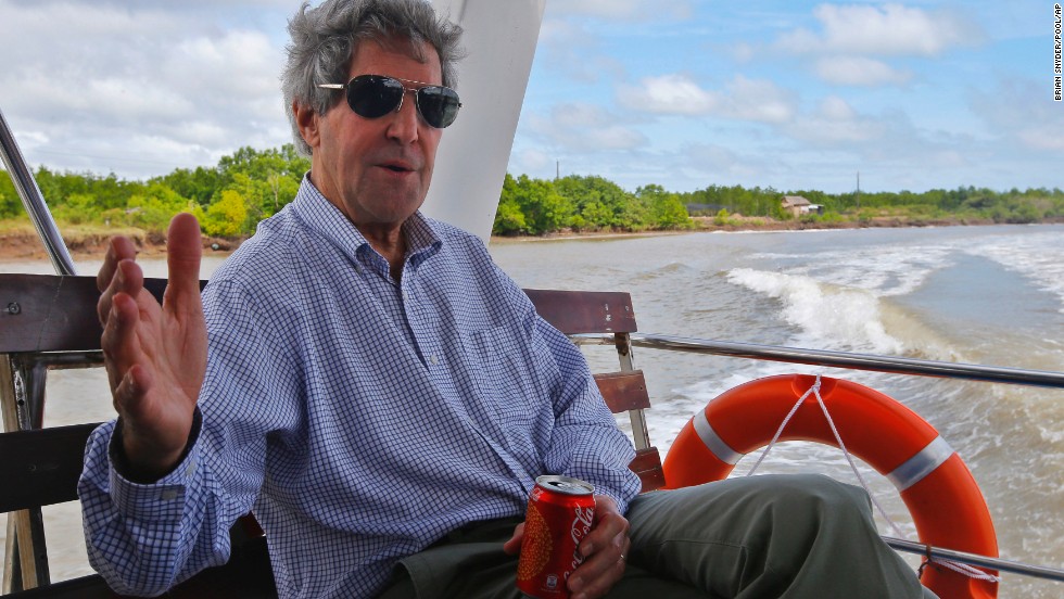 Kerry talks to reporters on a boat on the Mekong River Delta in Vietnam in December. Kerry had patrolled the muddy waters 40 years earlier as a U.S. naval officer. Kerry also visited Ho Chi Minh City and Hanoi. 
