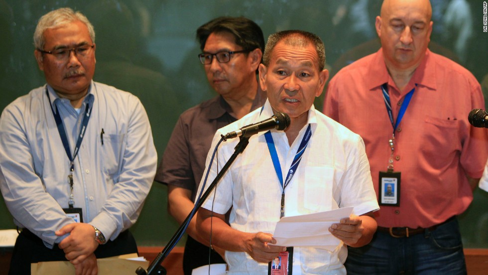 Malaysia Airlines Group CEO Ahmad Juahari Yahya, front, speaks during a news conference at a hotel in Sepang on March 8, 2014. &quot;We deeply regret that we have lost all contacts&quot; with the jet, he said.