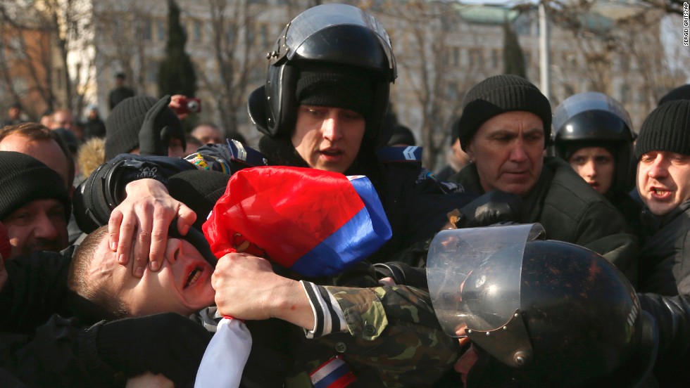 Ukrainian police detain a demonstrator during a pro-Russian rally in Donetsk on March 9. 