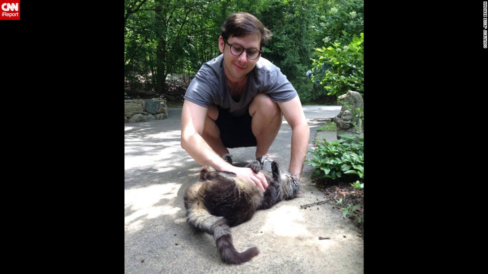 Jesse Berman, 27, a medical student, grew up with many pets, but also had symptoms of asthma and allergies. &quot;In spite of this, I&#39;ll still always be an animal lover and hope to have a dog or cat in my future,&quot; he said in his iReport. Here, he plays with his family&#39;s cat, Sigur. Afterwards he always has to wash his hands. 