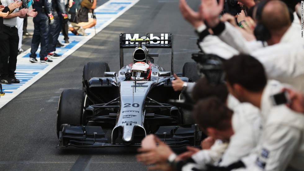 Kevin Magnussen receives the plaudits of his McLaren team after a stunning drive to finish on the podium on his F1 debut.