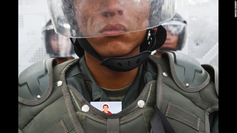 A National Guard member stands during an anti-government march in Caracas on March 16.