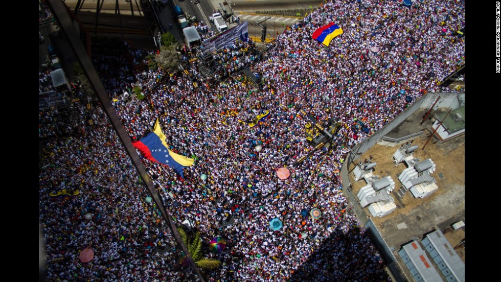 Thousands fill the streets of Caracas on Saturday, March 22, during an anti-government protest. Meanwhile, a crowd of pro-government students marched against what they called &quot;fascist violence.&quot;