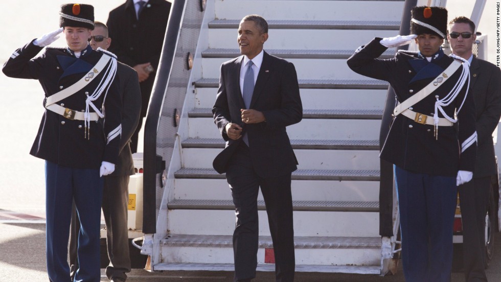 Obama disembarks from Air Force One after arriving in Amsterdam, Netherlands, on Monday, March 24. 