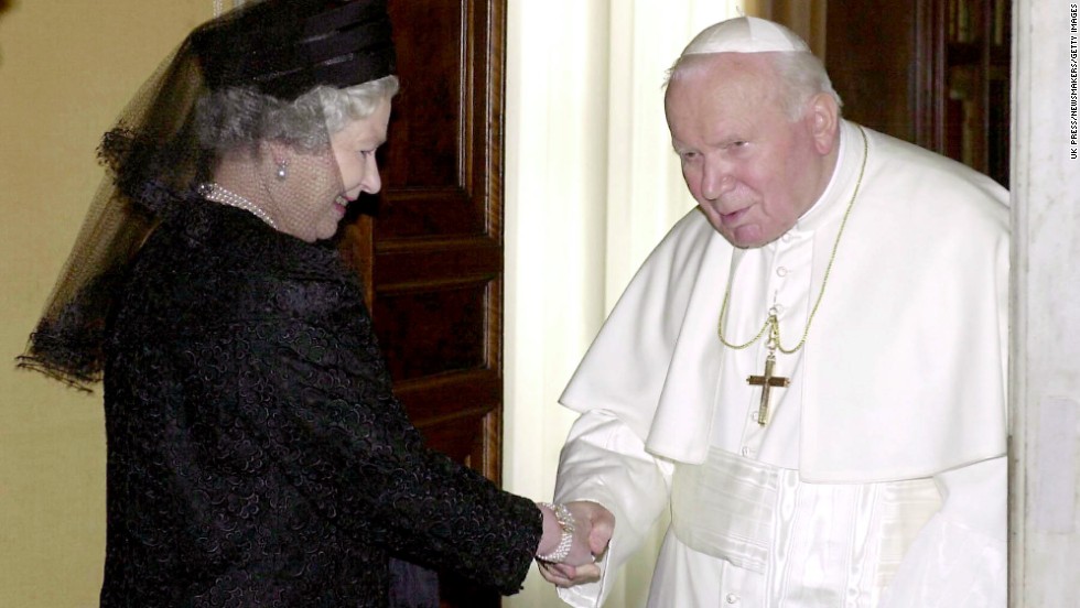 The Queen shakes hands with Pope John Paul II at the Pope&#39;s private office in October 2000.