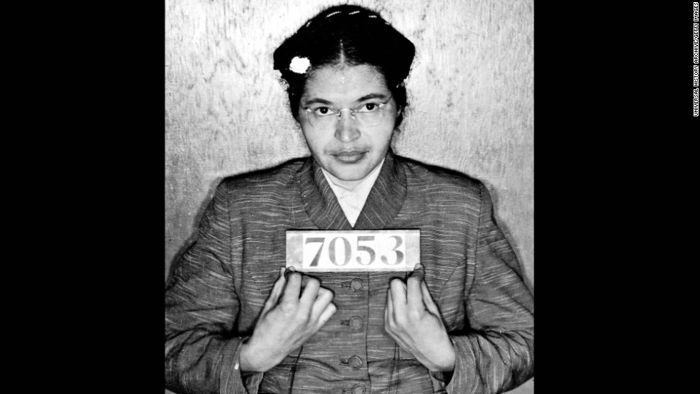 Rosa Parks poses for her booking photo after she was arrested in Montgomery, Alabama, for refusing to give up her bus seat to a white passenger in 1955.