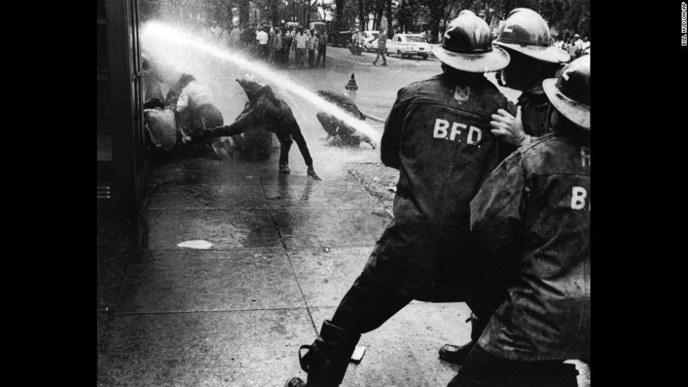 Firefighters turn their hoses on demonstrators in Birmingham in July 1963. When civil rights protesters stalled in Birmingham, the city&#39;s African-American children took to the streets. Their bravery facing water hoses and dogs riveted the nation.
