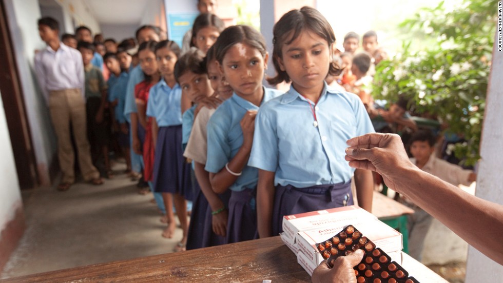 More than 500 million children worldwide are infected with &quot;Neglected Tropcial Diseases&quot;, including intestinal worms like hookworm, whipworm and roundworm -- aided by poor sanitation and living conditions. Pictured, children receive the deworming medicine albendazole. Hookworm was once widespread in the United States in the low-income, mainly African-American counties around Montgomery, Alabama. 